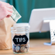 Image for article titled Ask The Salty Waitress: How much spectacle should I make of putting money in a tip jar?